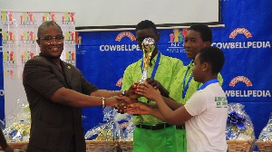 Winners of the competition taking their trophy