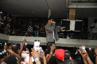 KiDi performing on stage