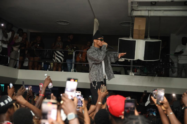 KiDi performing on stage