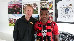 Patrick Kpozo with his new coach