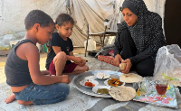 Sohair al-Bardoni with two of her children