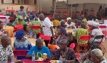 Some senior citizens enjoying their meal at the party