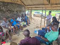 Firm Health Ghana Foundation  talking to some elderly people of Mfantefokrom