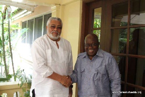 Former President Jerry John Rawlings in a handshake with President-elect Nana Akufo-Addo