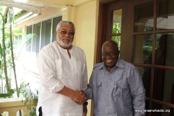 Former President Jerry John Rawlings and President Akufo-Addo exchanging pleasantries