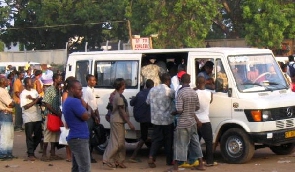 Passengers boarding a public transport