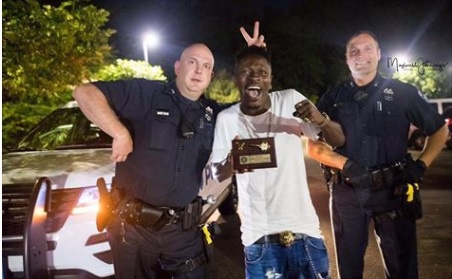 Shatta Wale and some American police men