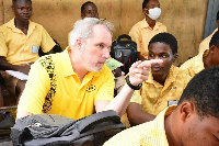 CEO of MTN Ghana, Stephen Blewett interacting with students of Aburi Presbyterian STS