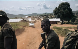 DRC soldiers ride in a vehicle in Mirangi, close to Kibirizi town, now controlled by M23 rebels