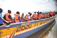 Teachers crossing to a community along the Volta Lake in Krachi East