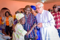 Vice President, Dr. Mahamudu Bawumia and Father Campbell with one of the lepers