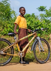File photo: School girl with bamboo bike