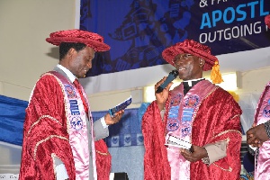 Apostle Dr Daniel Okyere Walker, the new PUC rector taking Oath of office