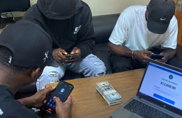 Photo of scammers in action. AI generated.