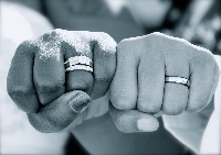 File photo of a couple flaunting their wedding rings