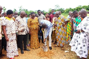 Sod cutting for the construction of a boys dormitory for Tweapease SHS