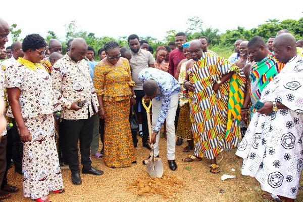 Sod cutting for the construction of a boys dormitory for Tweapease SHS
