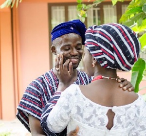Manasseh Azure with Serwaa, his new bride