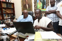 President Akufo-Addo with Eugene Arhin. Director of Communications at the presidency