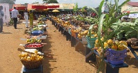 A display of food products and farm input at a farmers' day event in Ghana.