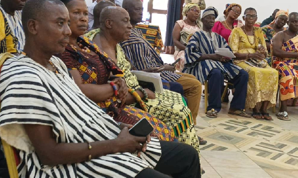 Participants of the dialogue seen sitting