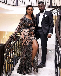 Sarkodie and Tracy Sarkcess pose for the camera at Becca