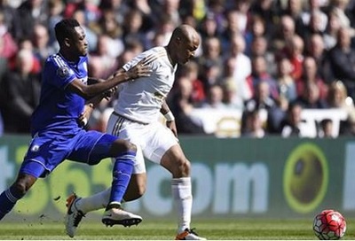 Baba Rahman tackles Ghana's Andre Ayew