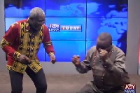 Perry Okudzeto and Hassan Ayariga dancing after reading the entertainment news on Joy News Today