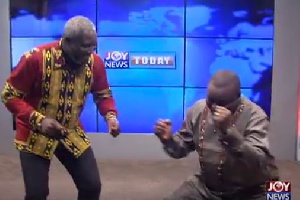 Perry Okudzeto and Hassan Ayariga dancing after reading the entertainment news on Joy News Today