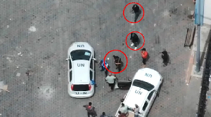 Drone footage published by the IDF, geolocated by CNN, shows the armed men near UN-marked vehicles
