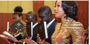 The EC chair, Jean Mensa (R) among her deputies during their swearing in ceremony