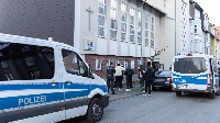 The police in Germany distracting the congregation from worshipping
