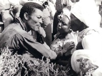 Jerry John Rawlings interacting with some citizens