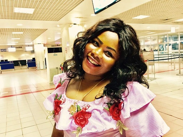 Anita Afriyie \'chops\' heavy love with husband at airport