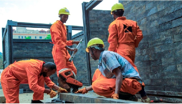 Workers work at the construction site of Kubik's first daycare building site in Addis Ababa, Ethiopi