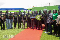 Mr. Joseph Osiakwah in a group photo with staff and volunteers of Access Bank