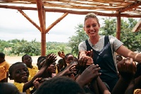 Former Pussycat Doll Kimberly playing with some kids in Ghana