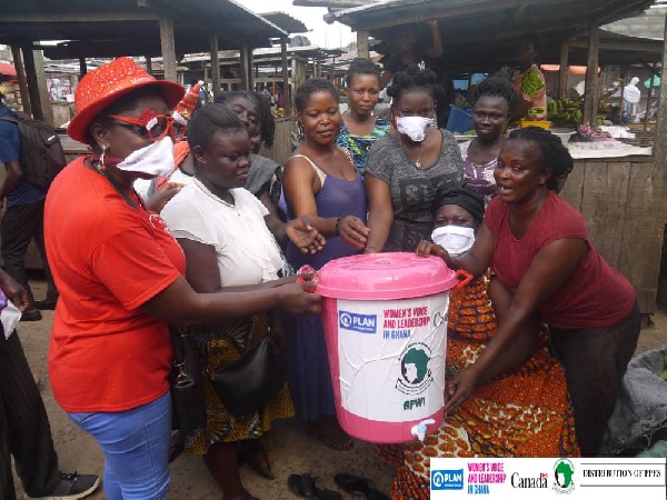 African Women International distributed Veronica bucket to traders Agona Market