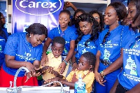Ghana's Most Beautiful Contestants with Dr. Ababio teaching handwashing