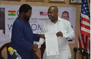 Dr Vanderpuije and Mr Baraka exchanging the MOU