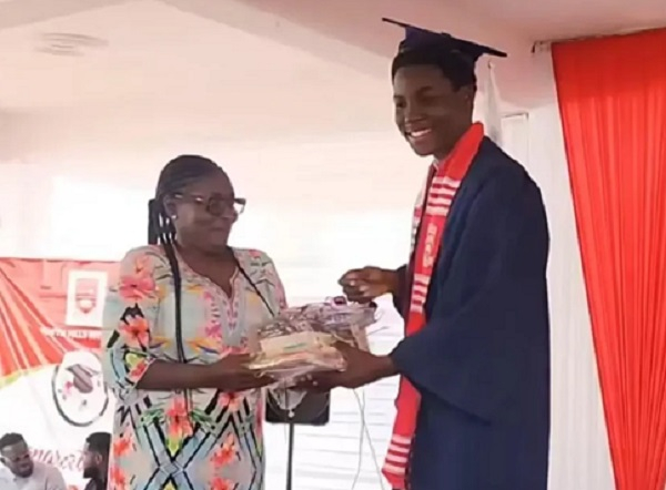 Speaker Alban Bagbin's son, Vielung Kwadwo Bagbin (right), receiving one of his awards