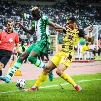Nigeria striker Victor Osimhen and Black Stars defender Alexander Djiku