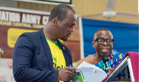 The CEO, Paul Kwabena Oduro, conferring with the Chairman of the Board of Directors Dr Emmanuel