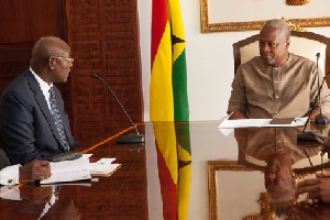 Edward Doe Adjaho[L] with President Mahama