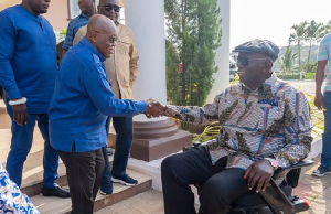 Former president Nana Addo Dankwa Akufo-Addo in a handshake with his 'boss', John Agyekum Kufuor
