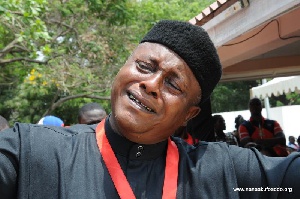 A man mourning the late Abuakwa North MP