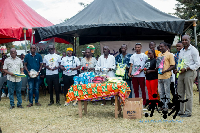 Facilitators of the football clinic in a photo with the participants