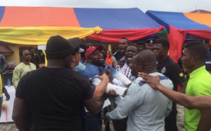 The NPP youth in a scuffle with the Upper West Akyem DCE