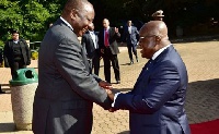 President Akufo-Addo in a handshake with South African President