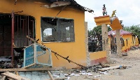A building belonging to the Fetish Priest was destroyed in 2015